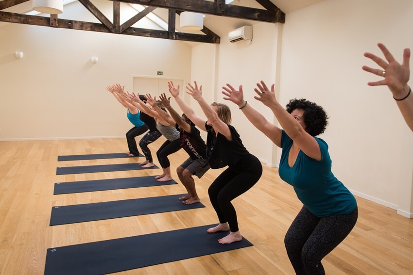 Grassroots-yoga-utkatasana-arms-focus | The Tannery Christchurch