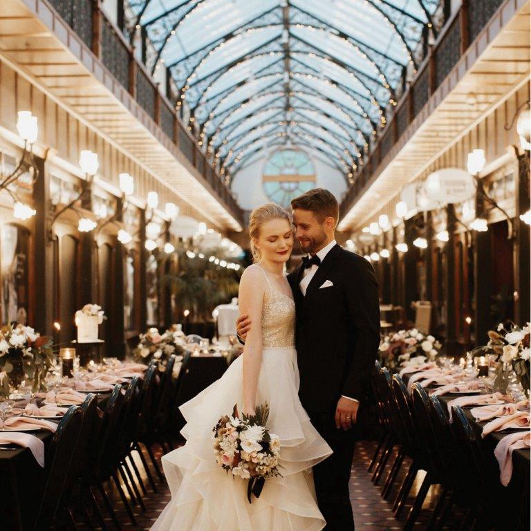 Bride and groom in the Atrium at The Tannery - Christchurch wedding venue